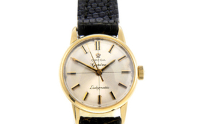 OMEGA - a lady's yellow metal Ladymatic wrist watch.