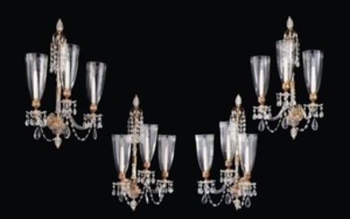 A SET OF FOUR GEORGE III CUT-GLASS AND ORMOLU THREE-BRANCH WALL LIGHTS, ATTRIBUTED TO PARKER AND PERRY, CIRCA 1800