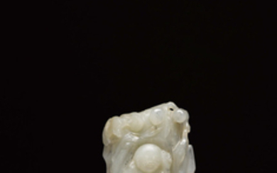 A small carved jade figural group of Liu Hai