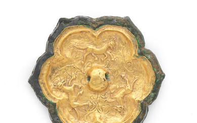 A rare gold-sheet-inlaid bronze foliate mirror