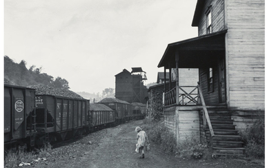 Marion Post Wolcott (1910-1990), Coal Miner's Child Taking Home Kerosene for Lamps - Company Houses, Coal Tipple in Background, Pursglove, Scotts Run, West Virginia (1938)