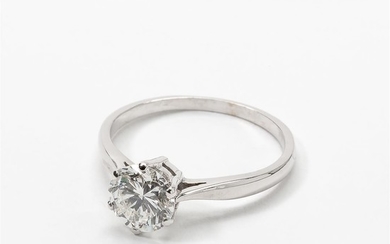 A 14 carat white gold and diamond solitaire...