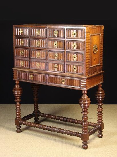 A 17th Century Portuguese Collector's Cabinet on Stand.