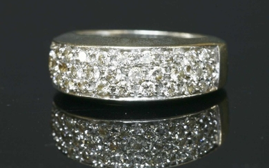 A 9ct gold pavé set diamond tapered band ring