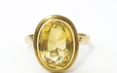 A 9ct gold ring set with central citrine. Ring size approx. ...