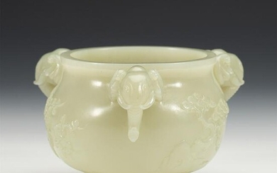 A CHINESE CARVED WHITE JADE ELEPHANT HEADS CENSER