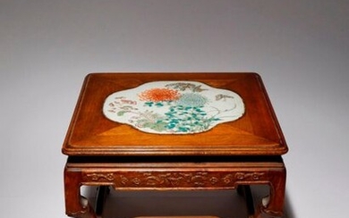 A CHINESE PORCELAIN INSET WOOD STAND LATE QING DYNASTY The...