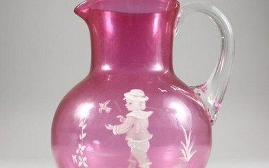 A CRANBERRY MARY GREGORY JUG.