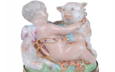 A Charles Gouyn St. James's factory type gilt-metal-mounted bonbonière and hinged moss-agate cover modelled as Cupid with a lamb, circa 1755