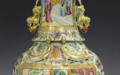 A Chinese Canton famille rose porcelain vase, mid-19th century, the ovoid body and flared neck appli