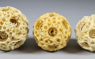 A Chinese Ivory Puzzle Ball, 19th Century, carved with...
