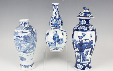 A Chinese blue and white porcelain double gourd shaped vase, mark of Kangxi but late 19th century, t