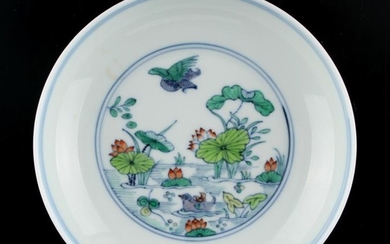 A Chinese doucai saucer dish painted with a pond...