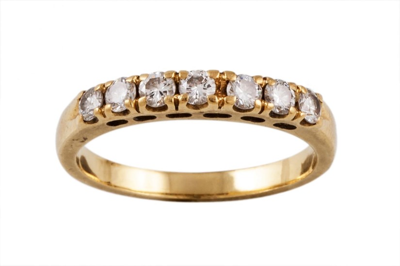 A DIAMOND HALF ETERNITY RING, with diamonds of 0.45ct in tot...