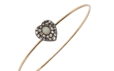 A DIAMOND, OPAL AND GOLD BANGLE. the gold bangle is mounted ...
