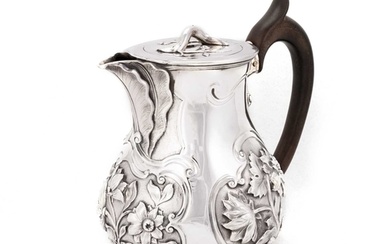 A GEORGE IV SILVER HOT WATER JUG by Paul Storr, London 1829,...