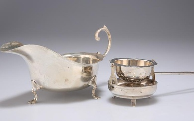 A GEORGE V SILVER SAUCE BOAT, AND A FOREIGN SILVER TEA STRAINER