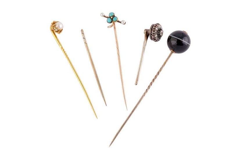 A GROUP OF FIVE STICK PINS
