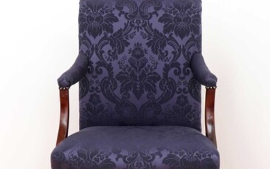 A George III mahogany Gainsborough armchair