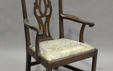 A George III mahogany gentleman's elbow chair with a pierced splat back and drop-in seat, heigh