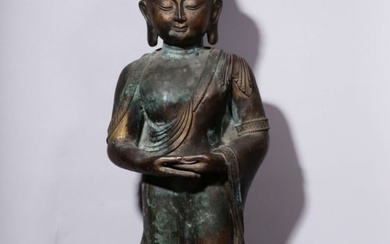 A Large Chinese Carved Bronze Figure of Standing Buddha