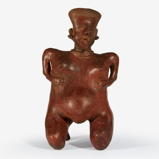 A Nayarit pottery figure of a pregnant woman, 100 BCE