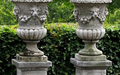A PAIR OF CARVED LIMESTONE GARDEN URNS, LATE 19TH OR EARLY 20TH CENTURY