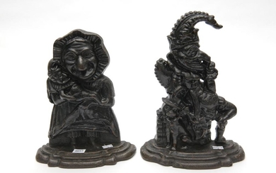 A PAIR OF CAST IRON PUNCH AND JUDY DOOR STOPS