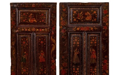 A PAIR OF QAJAR PAINTED AND GESSO APPLIED WOODEN DOORS, 19TH...