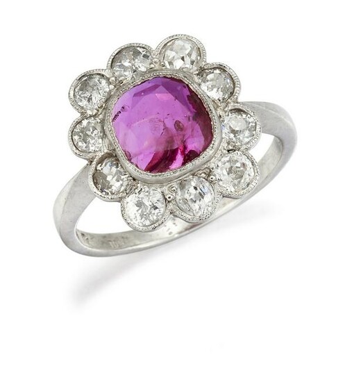 A PLATINUM RUBY AND DIAMOND CLUSTER RING, the cushion