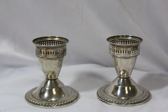 A Pair Of Sterling Candle Holders