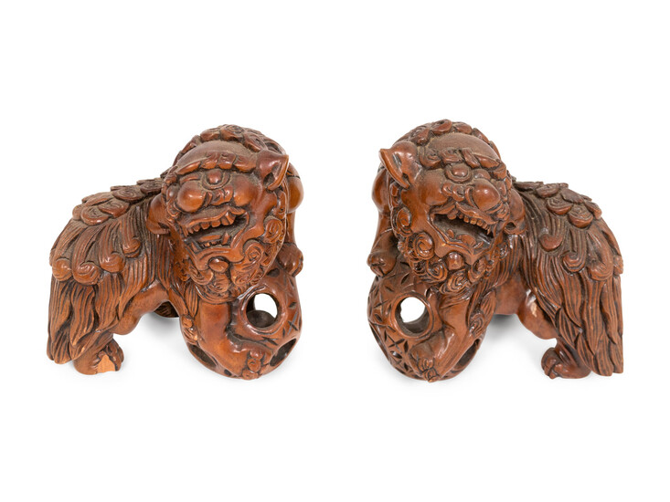 A Pair of Carved Wood Guardian Lions