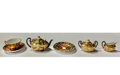 A Royal Crown Derby Imari 2451 pattern miniature teapot, suc...