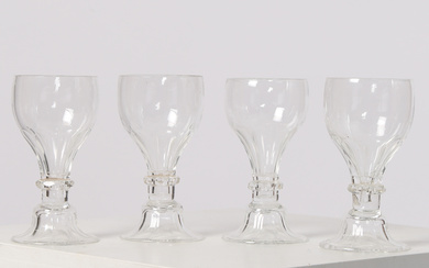 A SET OF FOUR 19TH CENTURY HOLLOW STEM WINE GLASSES, CIRCA 1880 (4).