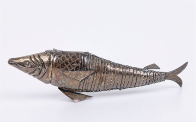 A SILVER FISH SHAPED SPICE CONTAINER
