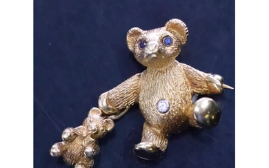 A Tiffany diamond and sapphire set teddy bear brooch set in ...