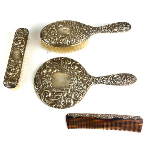 A VICTORIAN SILVER BRUSH, COMB AND MIRROR SET Along with two...