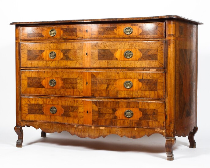A Victorian walnut veneered inlaid serpentine chest of drawers