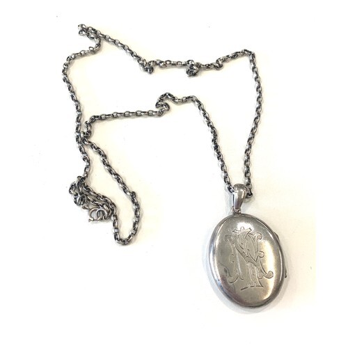 A Victorian white metal pendant and chain circa 1895