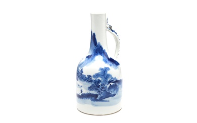 A blue and white porcelain jug painted with a continuous of landscape design decorated with Chi-longs dragon at handles