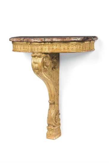 A carved giltwood console table, late 19th century