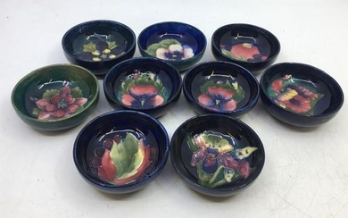 A collection of nine small Moorcroft art pottery bowls, diameter:...