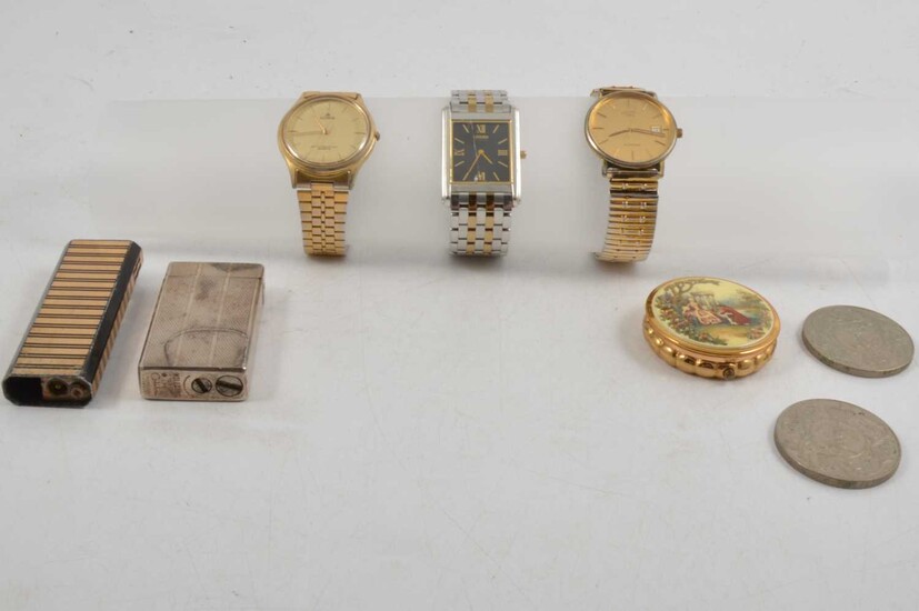 A collection of wristwatches, cigarette lighters, bead necklaces, commemorative crowns.