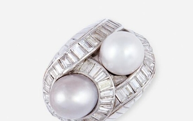 A cultured pearl, diamond, and platinum ring