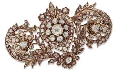 A diamond brooch, late C19th Turkish, of foliate scroll design set with rose-cut diamonds.