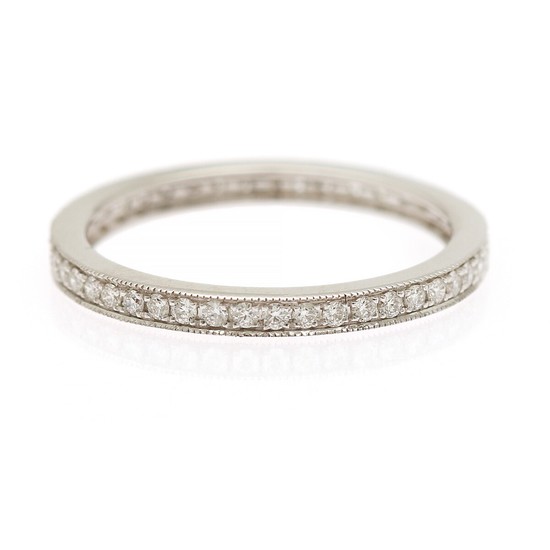 A diamond eternity ring set with numerous brilliant-cut diamonds totalling app. 0.30 ct., mounted in 18k white gold. E/VVS. Size 52.