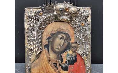 A good late 18th century Russian silver gilt mounted icon of...