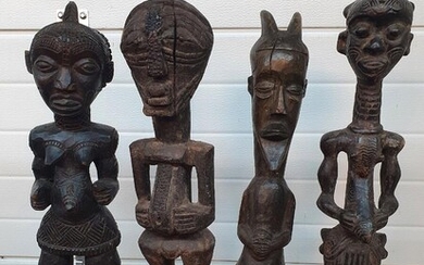 SOLD. A group of African carved wood figures. H. 25-50 cm. (16) – Bruun Rasmussen Auctioneers of Fine Art