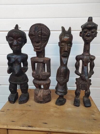 SOLD. A group of African carved wood figures. H. 25-50 cm. (16) – Bruun Rasmussen Auctioneers of Fine Art