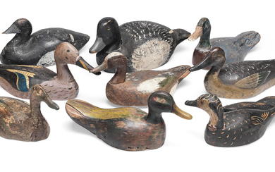 A group of nine polychrome-decorated wooden duck decoys, 20th century